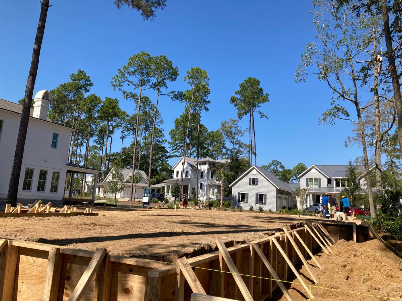 Deep formed concrete footings braced and ready for pouring on a custom home lot